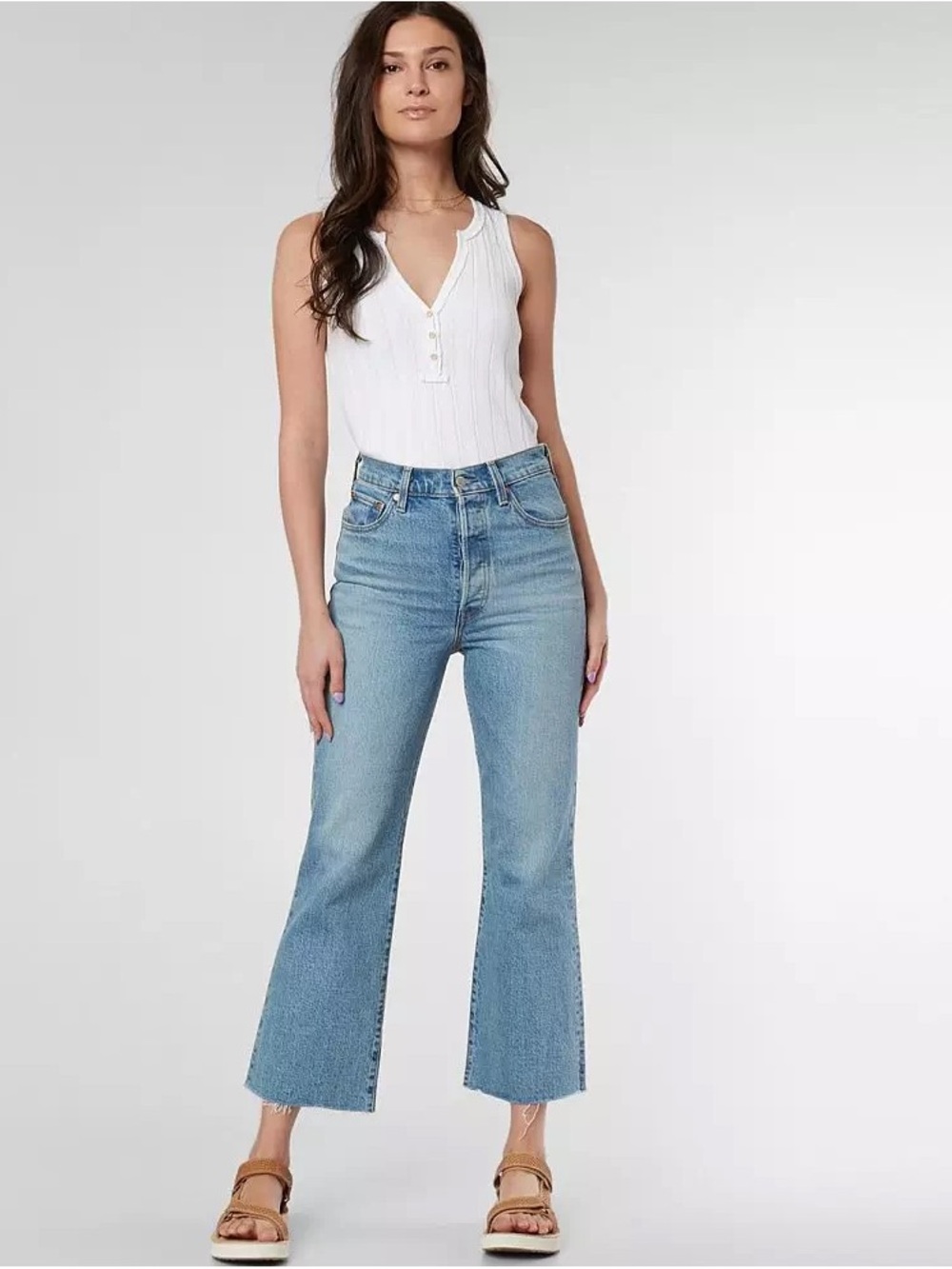 Levi’s High Waisted Light Blue Cropped Flare Jeans with Raw Hem